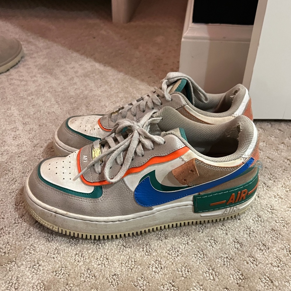 Nike Kids Sneakers with Blue and Orange Accents